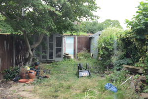 The two old garden sheds